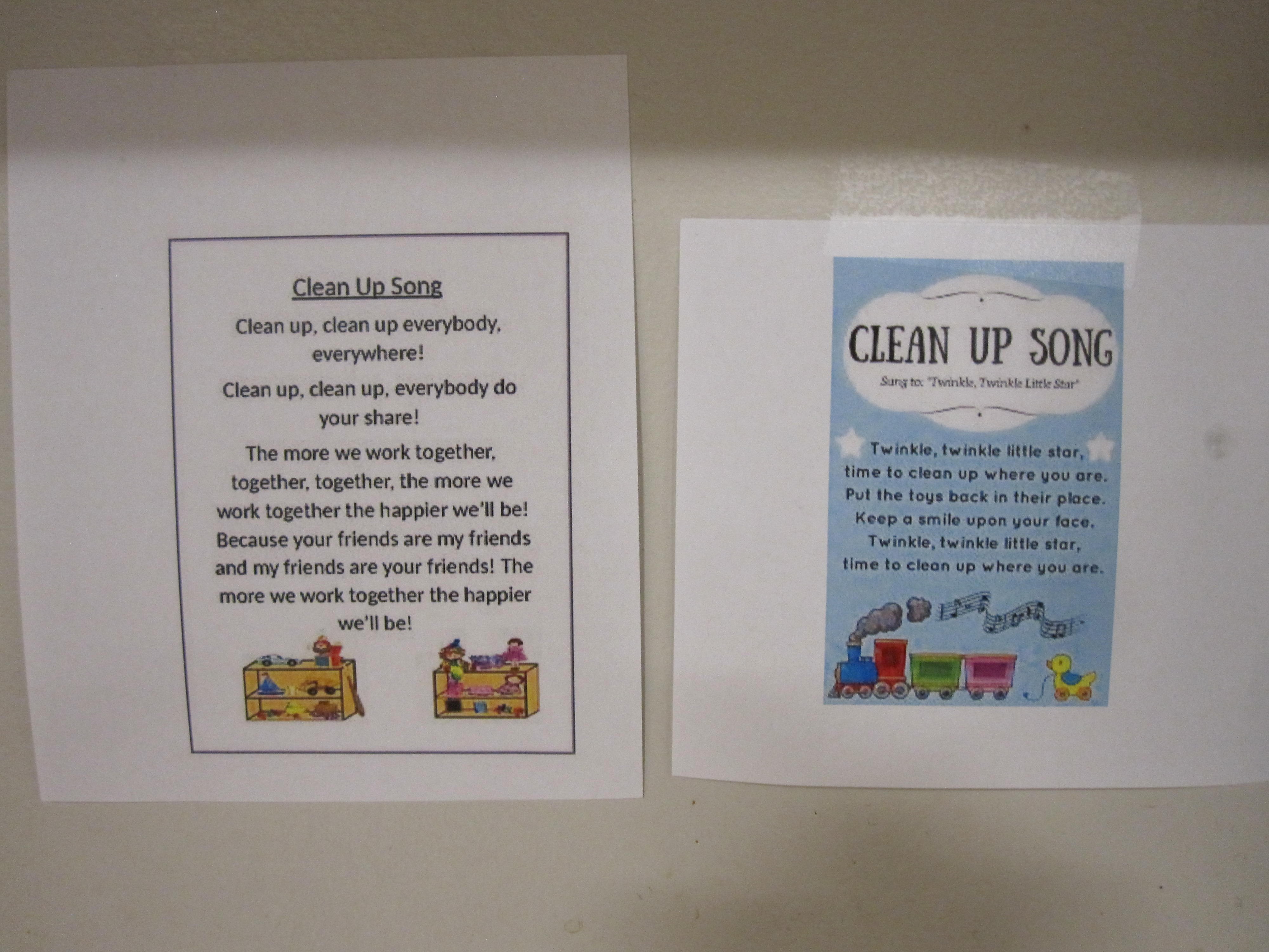 a picture of two signs featuring lyrics for 'the clean up song'