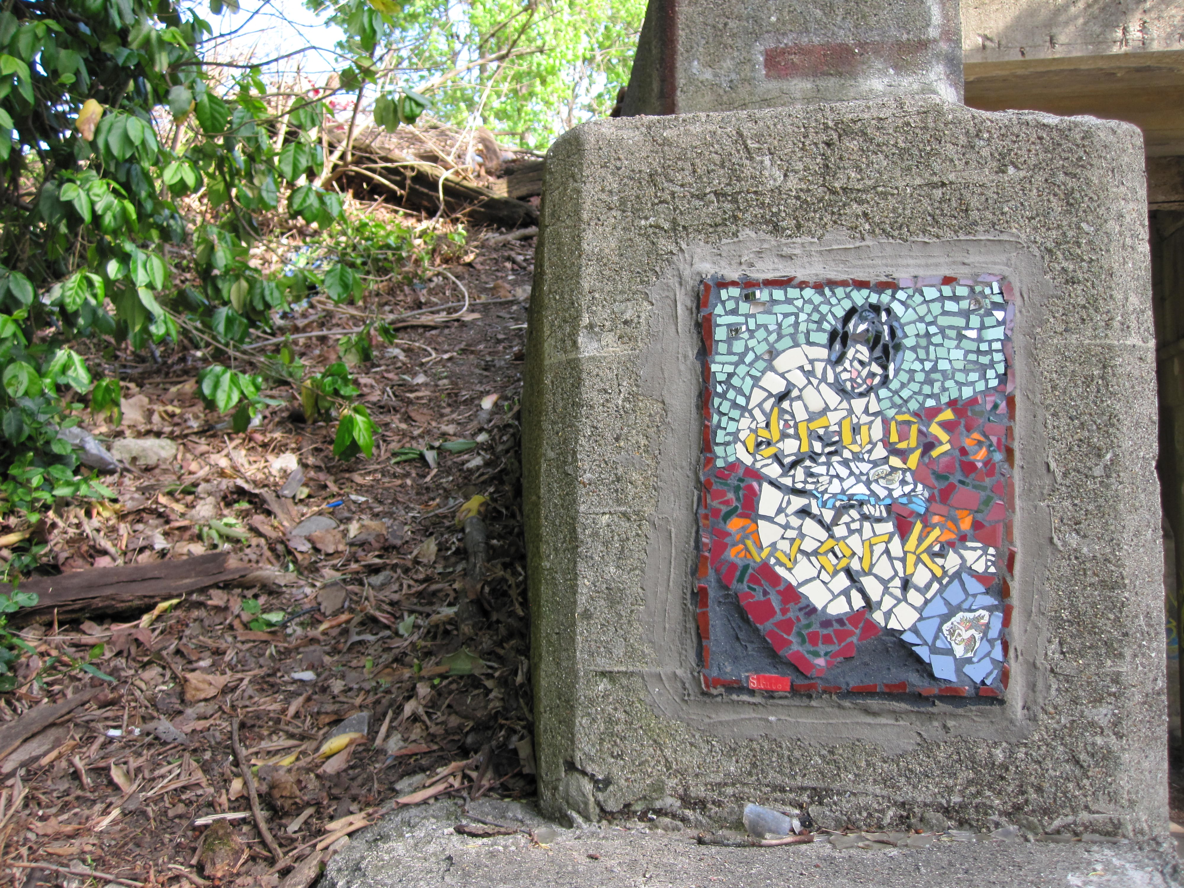 a mosaic that says DRUGS WORK