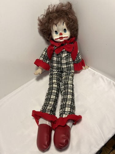 a haunting softbody clown with long legs and a penetrating stare