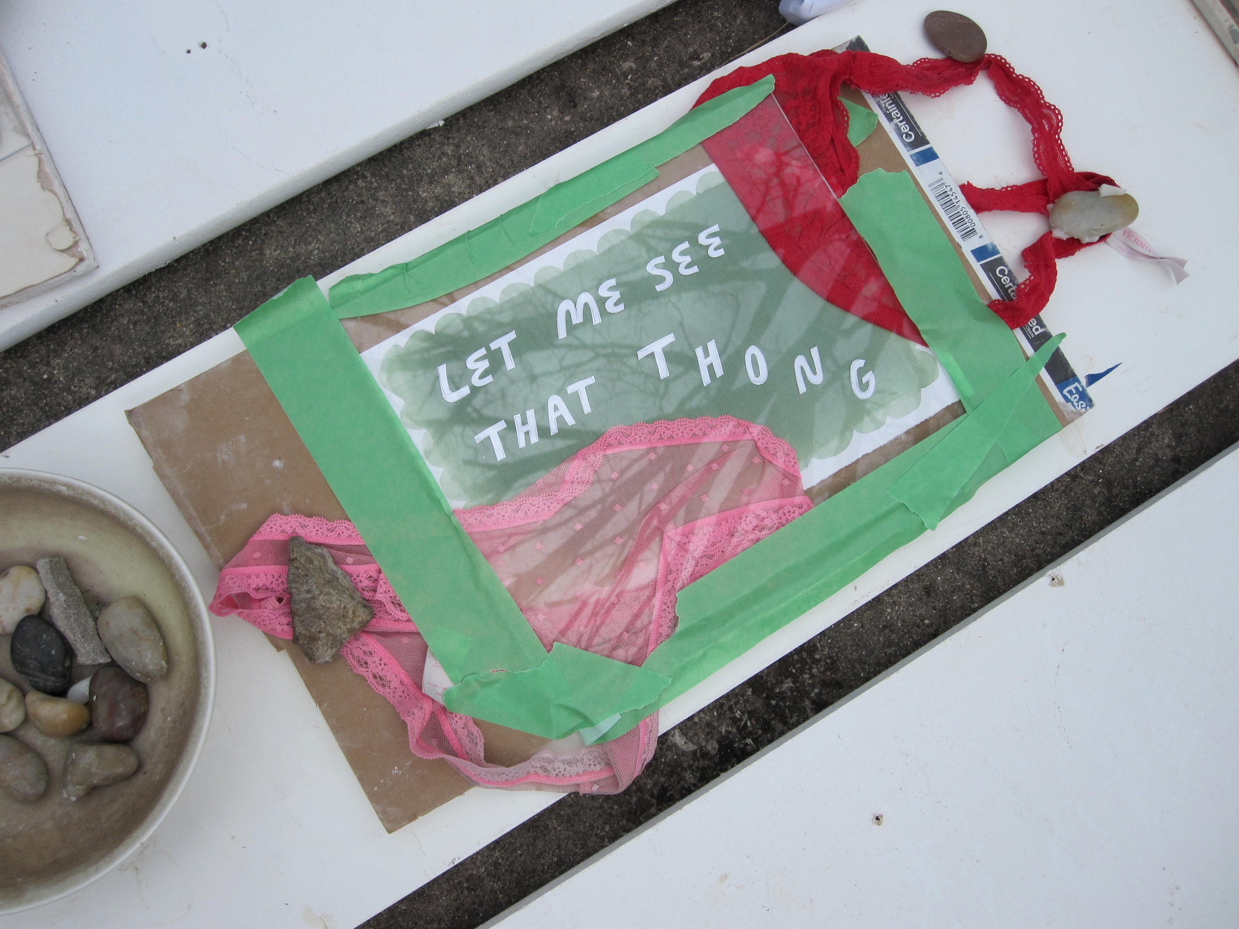 a cyanotype of lace thongs and lyrics from the thong song